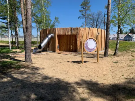 Playground as fencing around the well.