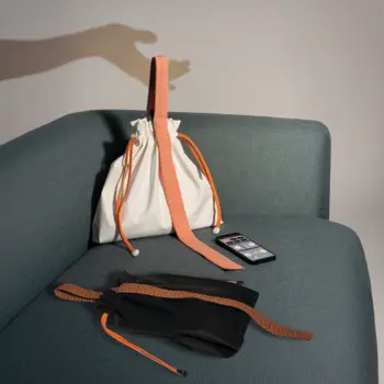 HygieniWarm Grip Pouch: Smart Textile Fusion for Warmth, Hygiene, and Sustainability